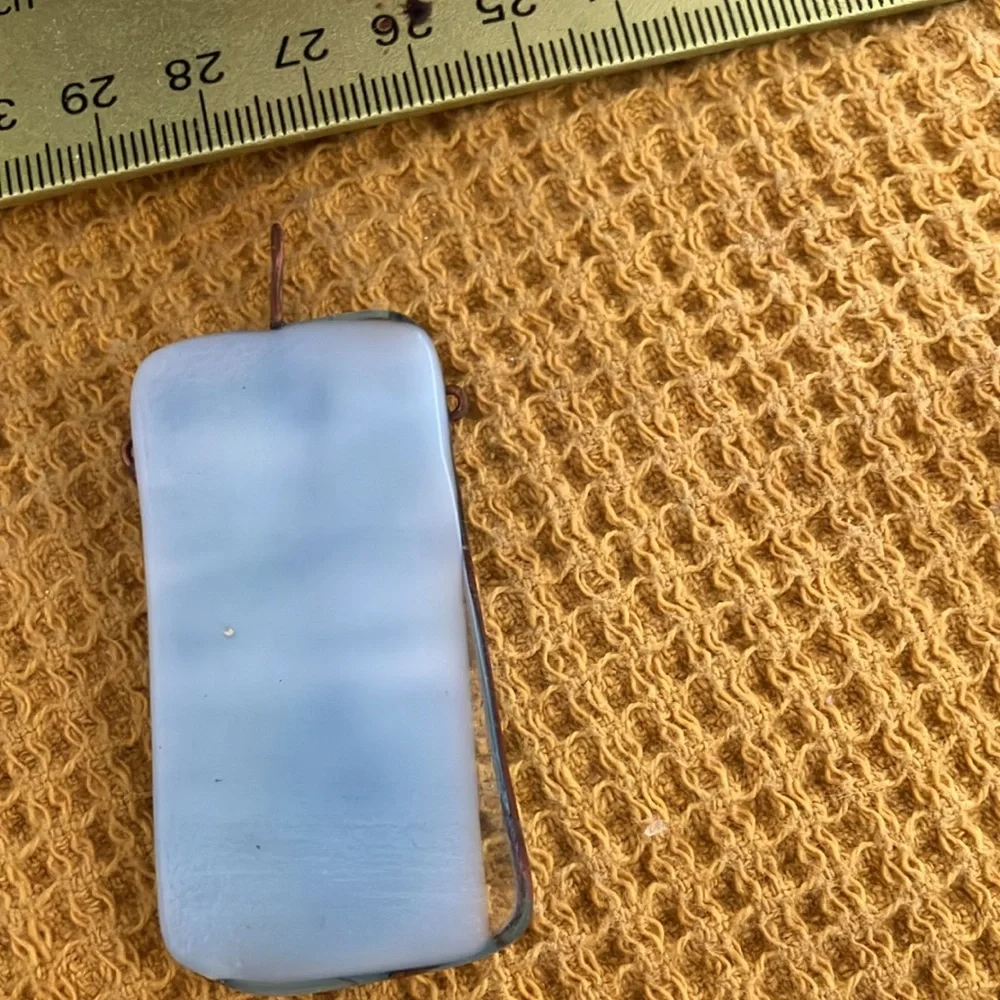 Light blue wire wrapped glass pendant